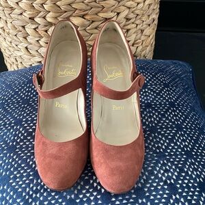 Size 38 Christian Louboutin red bottoms in perfect condition- brown suede